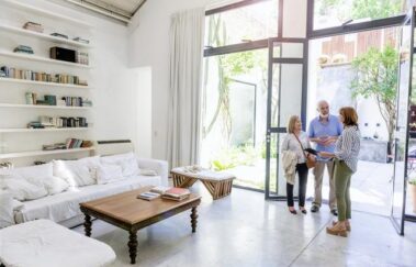 real estate agent in California shows home to couple